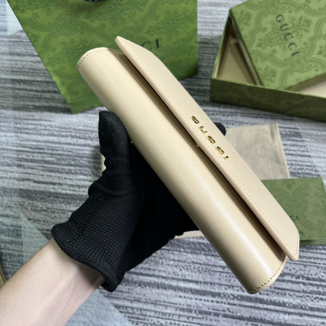 continental wallet with G*u*i script light yellow 7.5"w x 4"h x 1.4"d